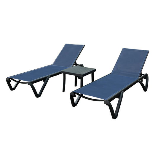 Two navy blue mesh patio chaises with black frames and a small black side table