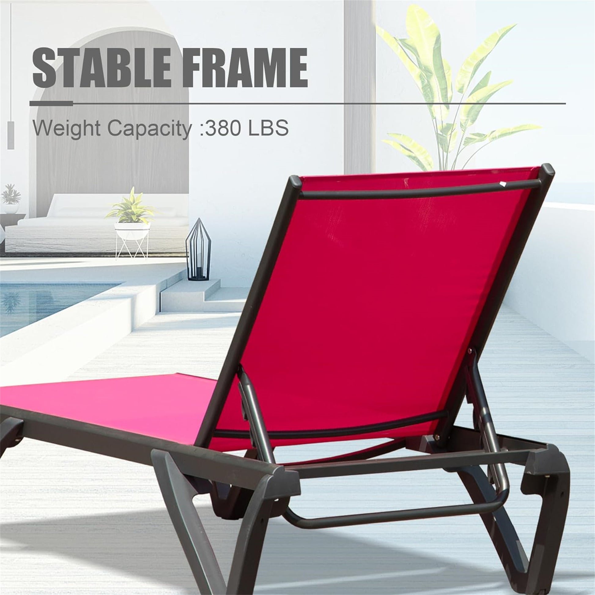 Crimson red outdoor chaise lounge with durable dark metal frame for patio relaxation