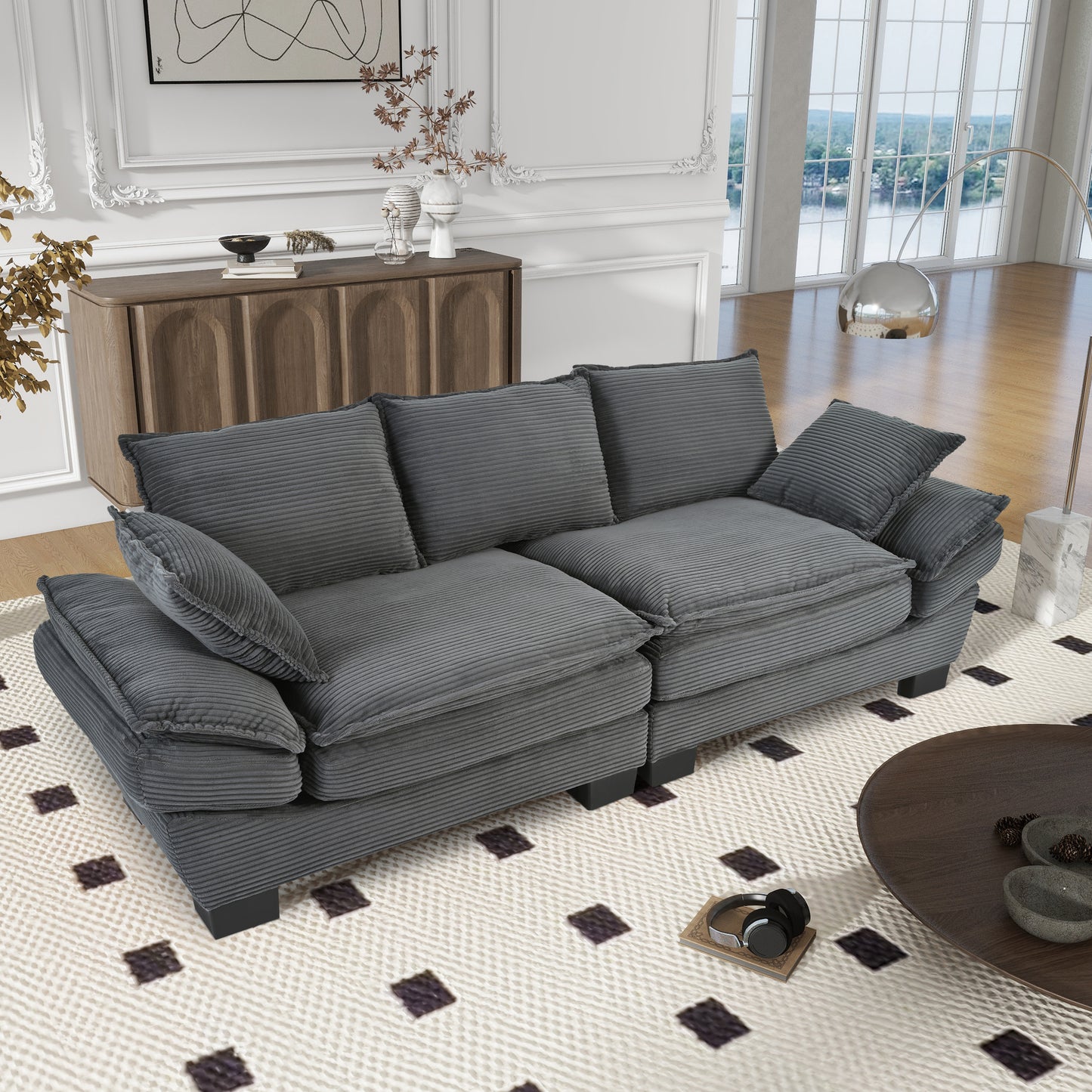Plush grey corduroy sofa with deep seats and accent pillows for a cozy living room