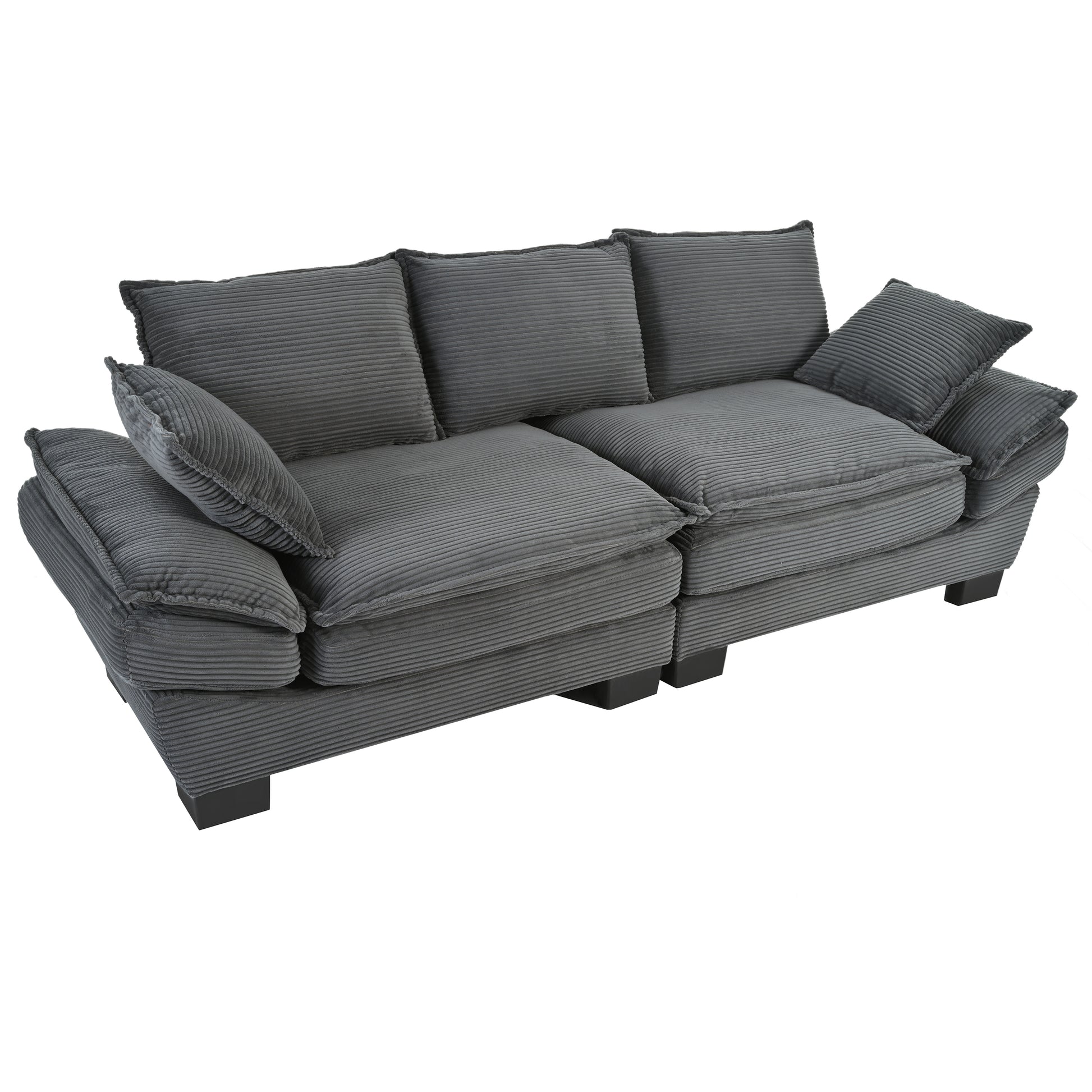Plush grey corduroy sofa with deep seating and plush throw pillows ideal for modern living rooms