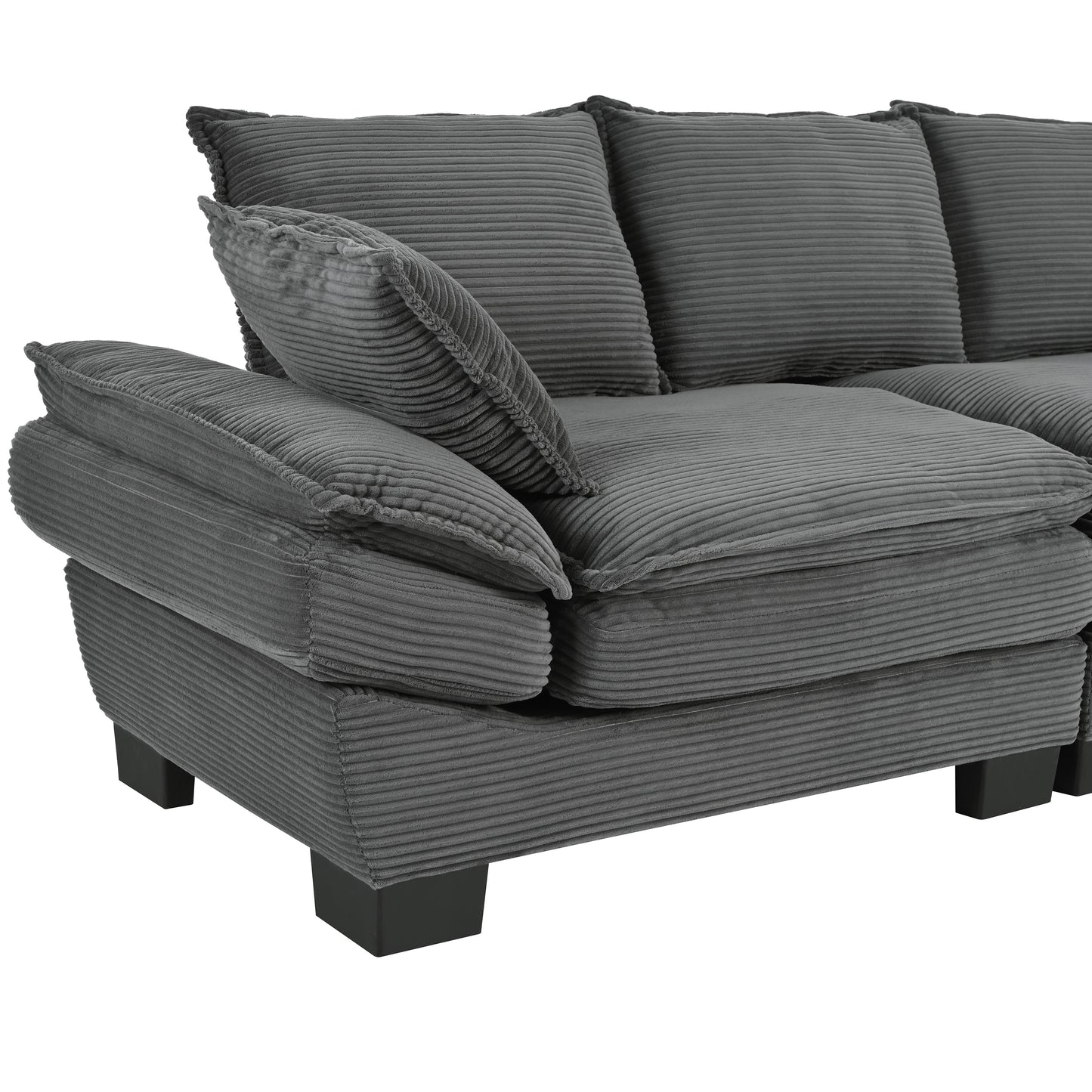 Plush grey corduroy sectional sofa with deep cushions and matching throw pillows