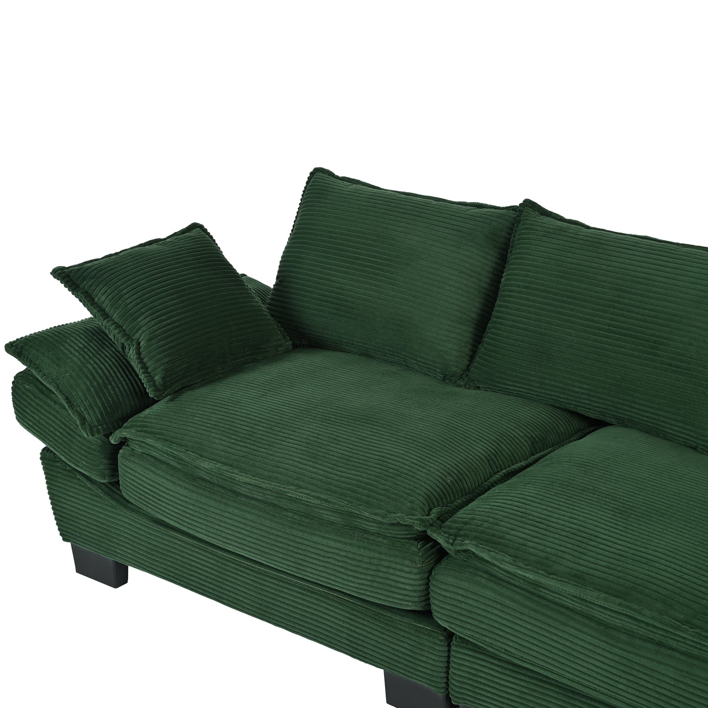 Plush emerald green corduroy sofa with deep comfortable cushions