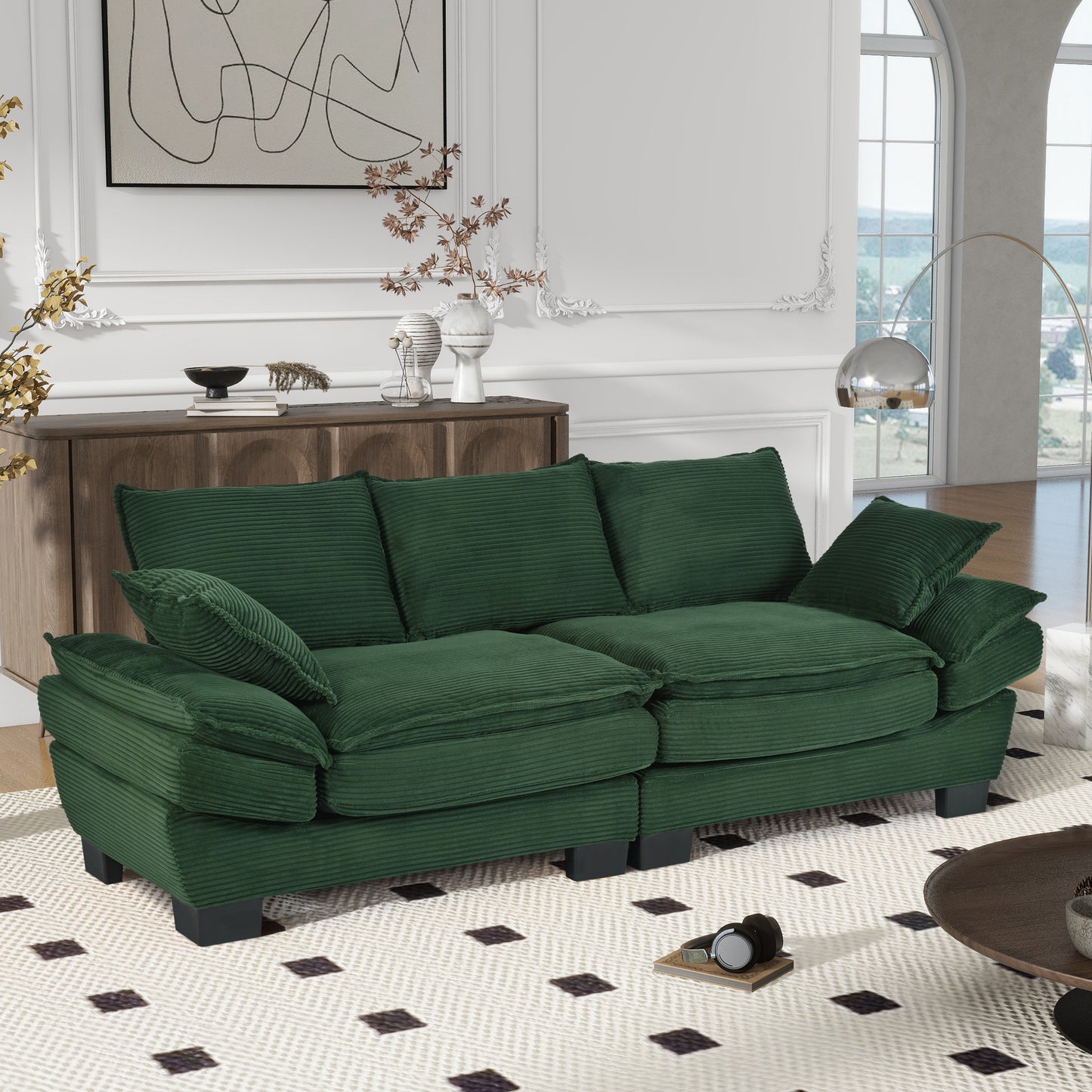 Deep green corduroy sofa with plush cushions and a modern design perfect for living room comfort
