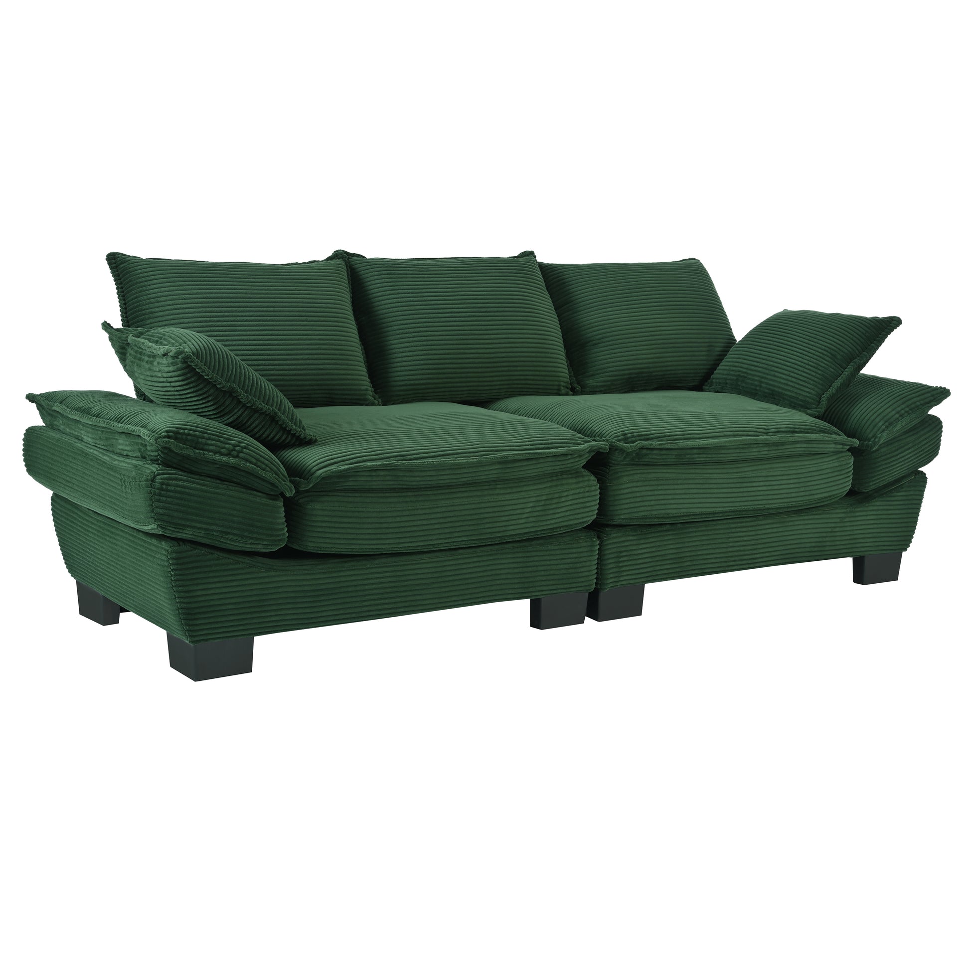 Deep green corduroy threeseater sofa with plush cushions and black block feet