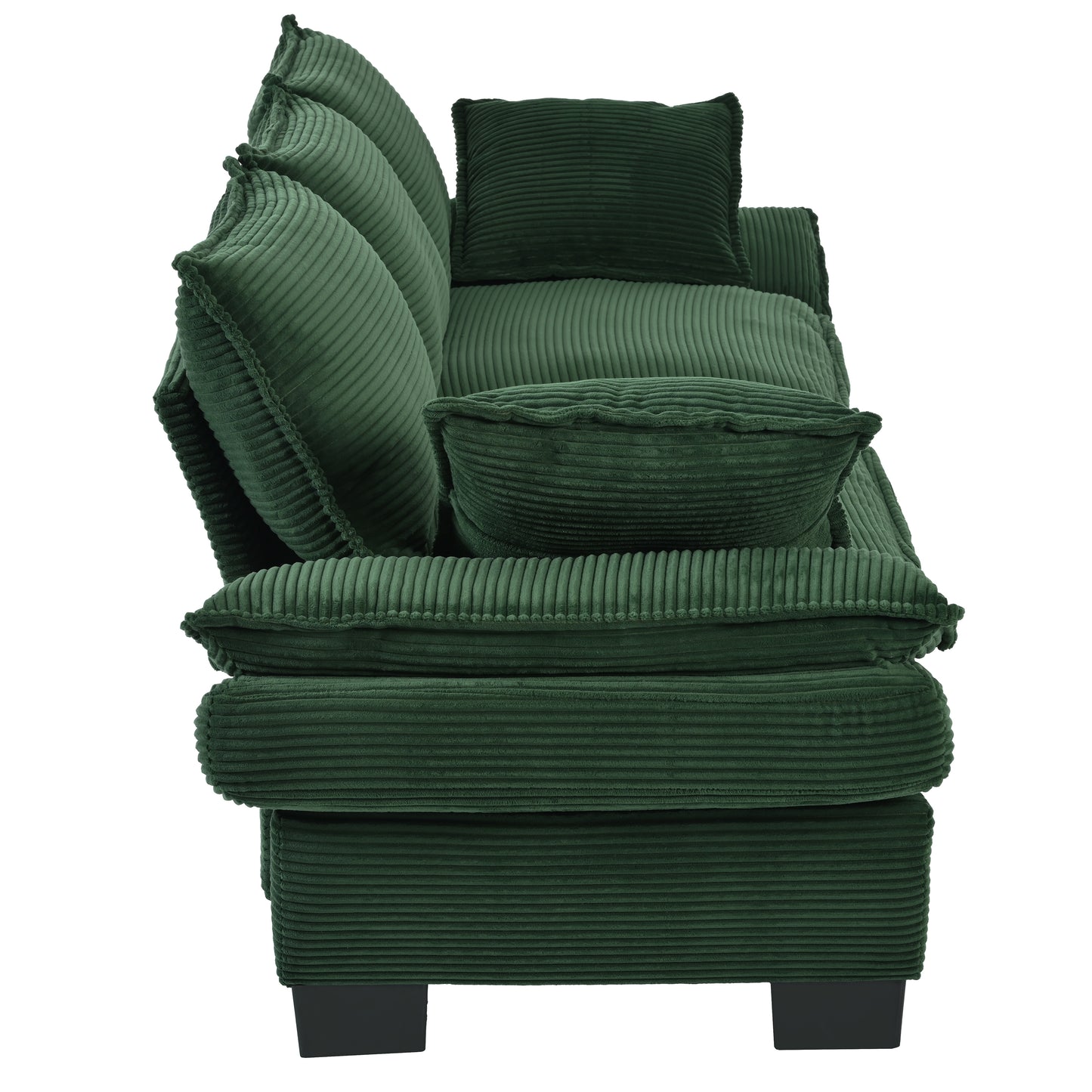 Deep green corduroy sofa with plush textured cushions for ultimate comfort
