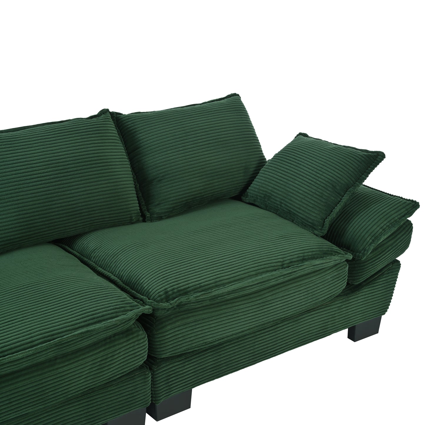 Deep green corduroy sectional sofa with plush cushions and a modern design