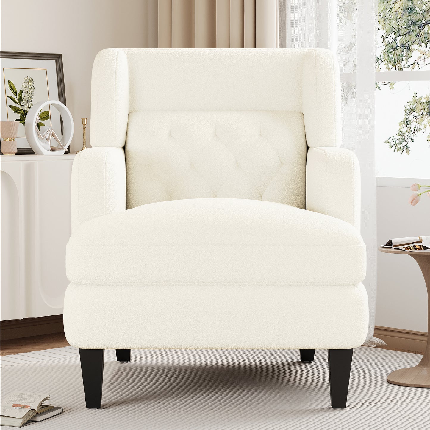 Cream boucle armchair with button tufting and black tapered legs