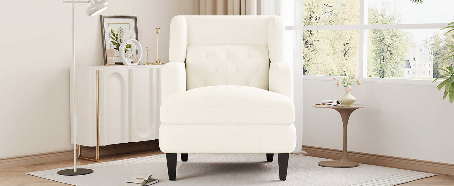 Cream textured accent chair with tufted back and dark wood legs