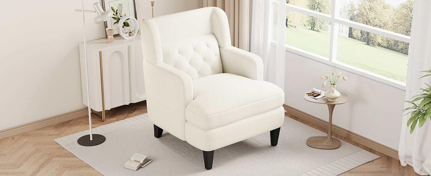 Cream boucle armchair with tufted back and dark wooden legs