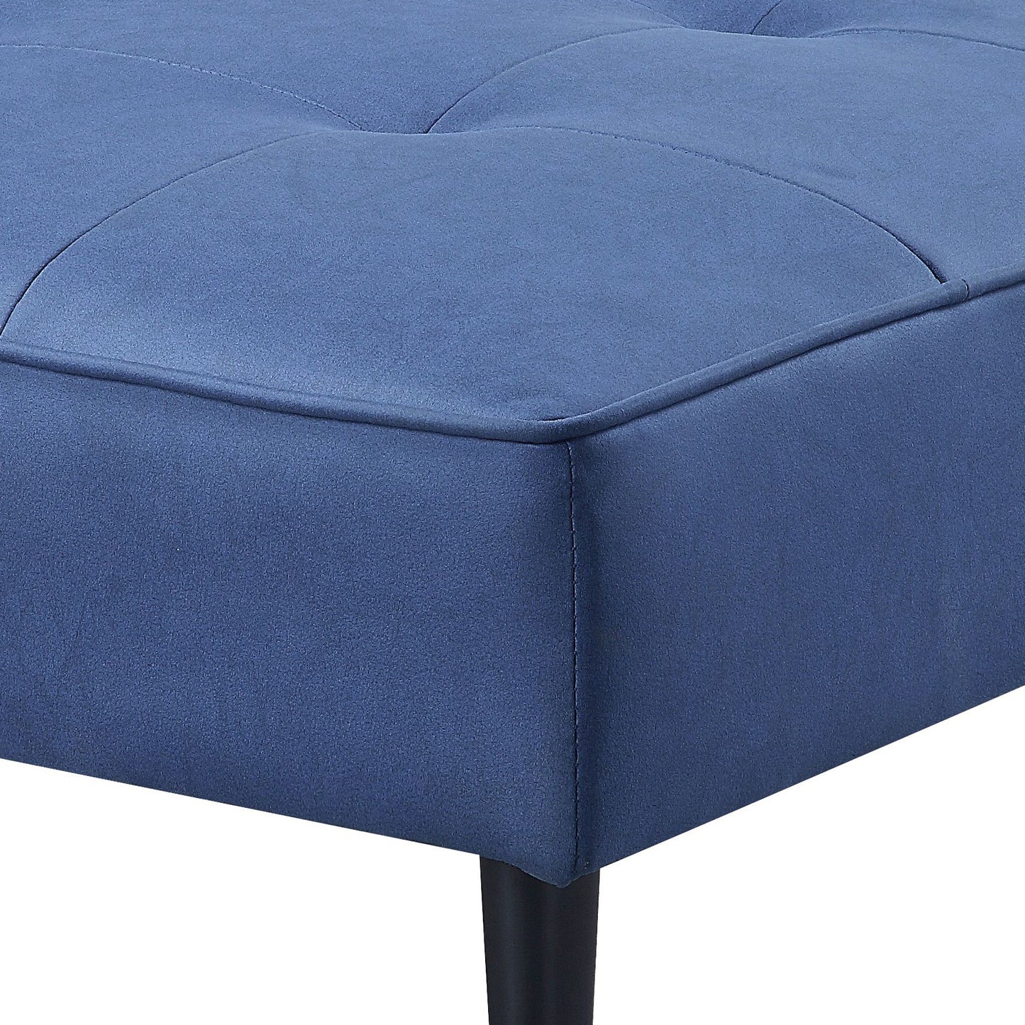 Tufted navy blue microfiber ottoman with plush cushioning and dark legs