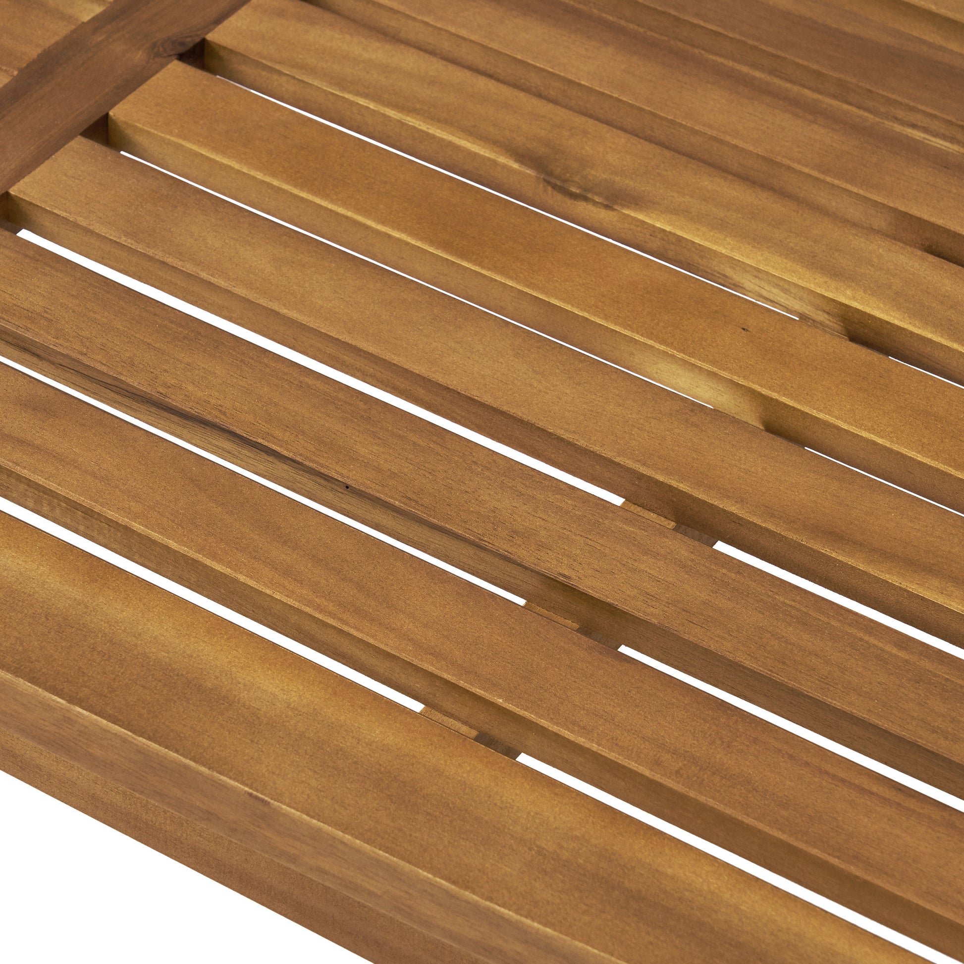 Closeup of a slatted wooden bench with natural grain outdoor furniture