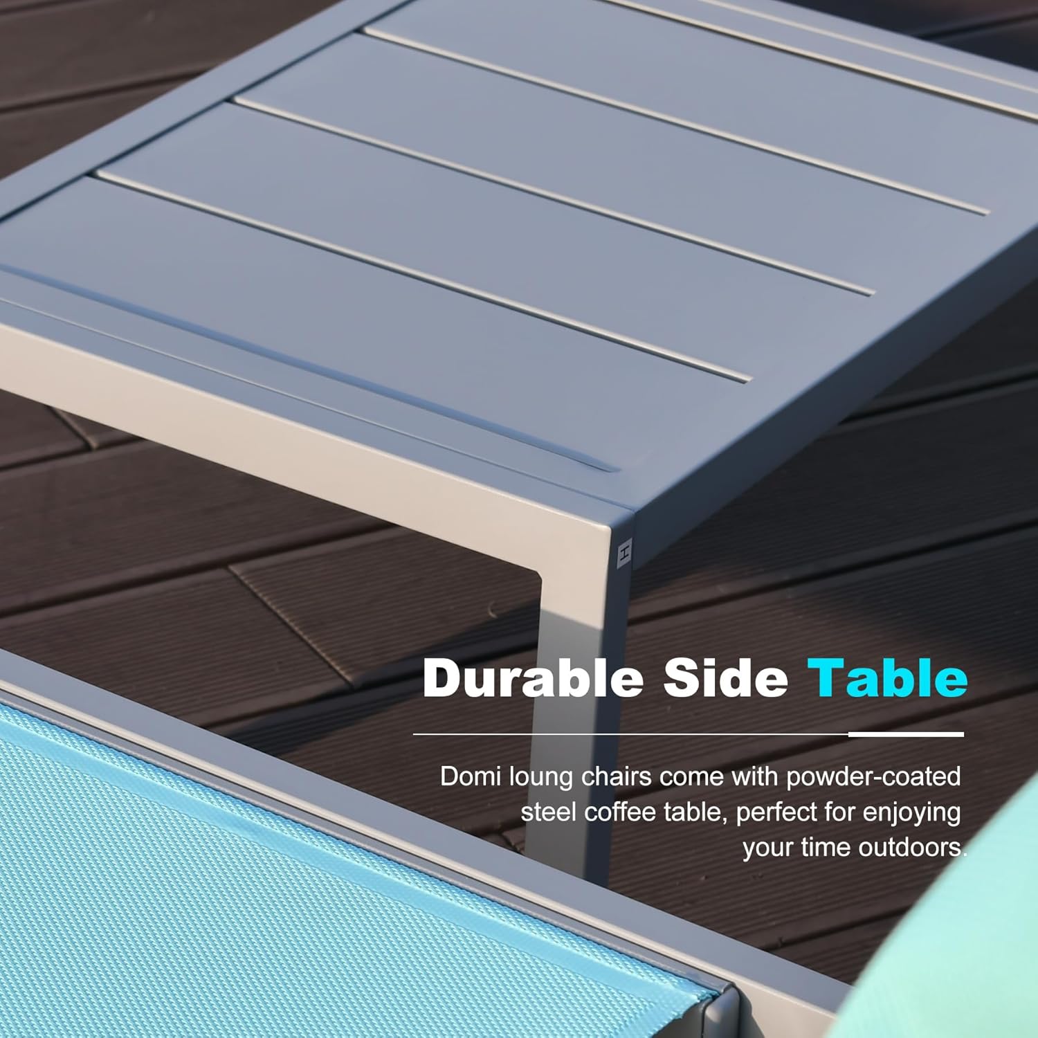 Gray powdercoated steel outdoor side table with slatted top on dark wood deck