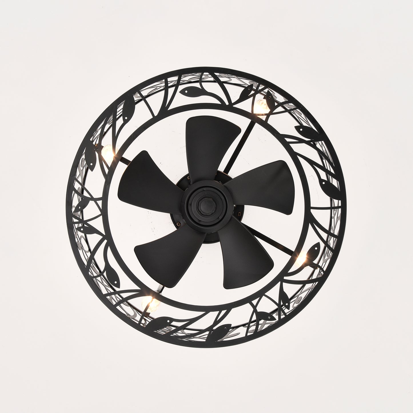 Black industrial ceiling fan with ornate metal leaf design and integrated lights