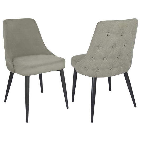 Light grey upholstered dining chair with tufted back and black legs