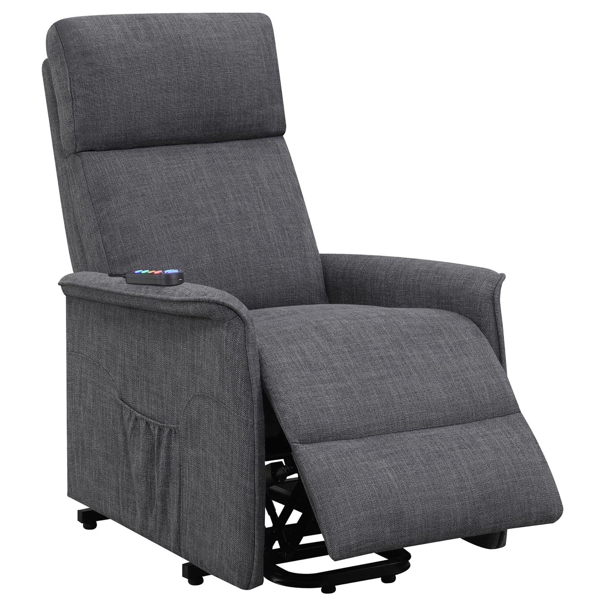 Dark grey fabric lift chair with reclining footrest and remote control on armrest