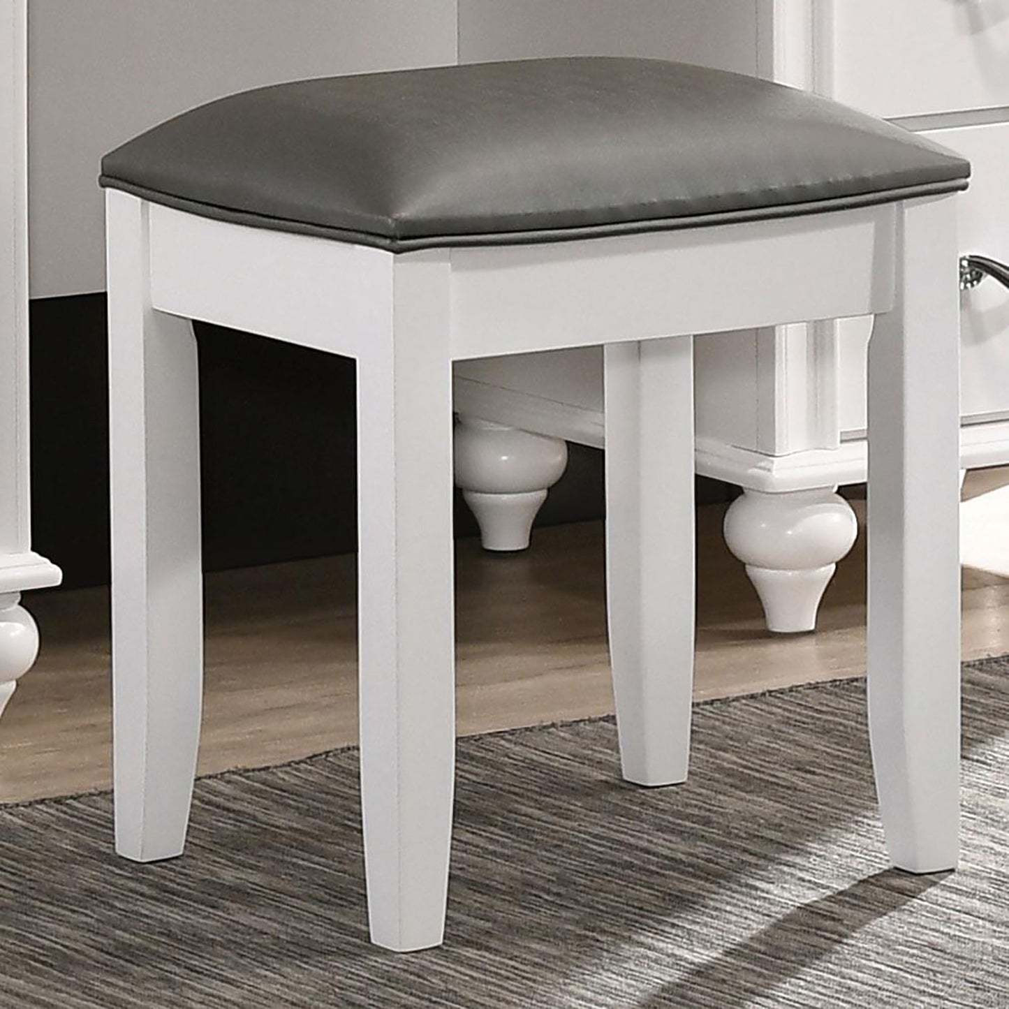 White vanity stool with padded grey faux leather seat ideal for makeup stations