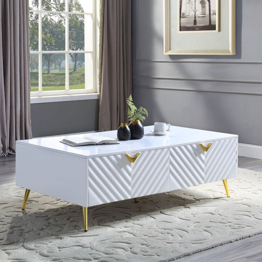 Modern white coffee table with chevron drawers and gold legs perfect for living rooms