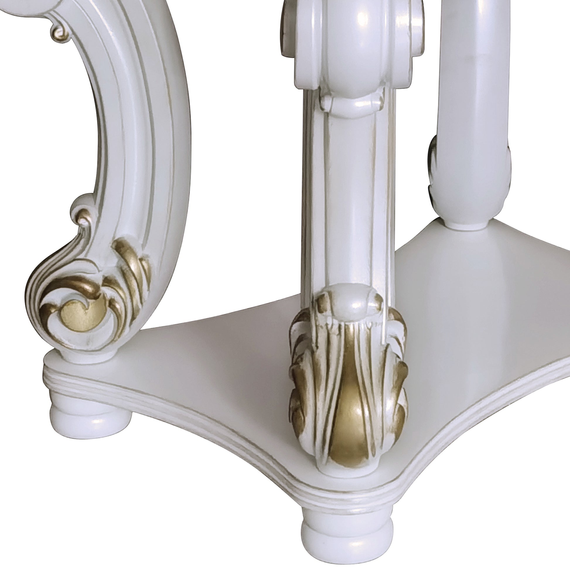 White ornate table legs with gold accents rococo style