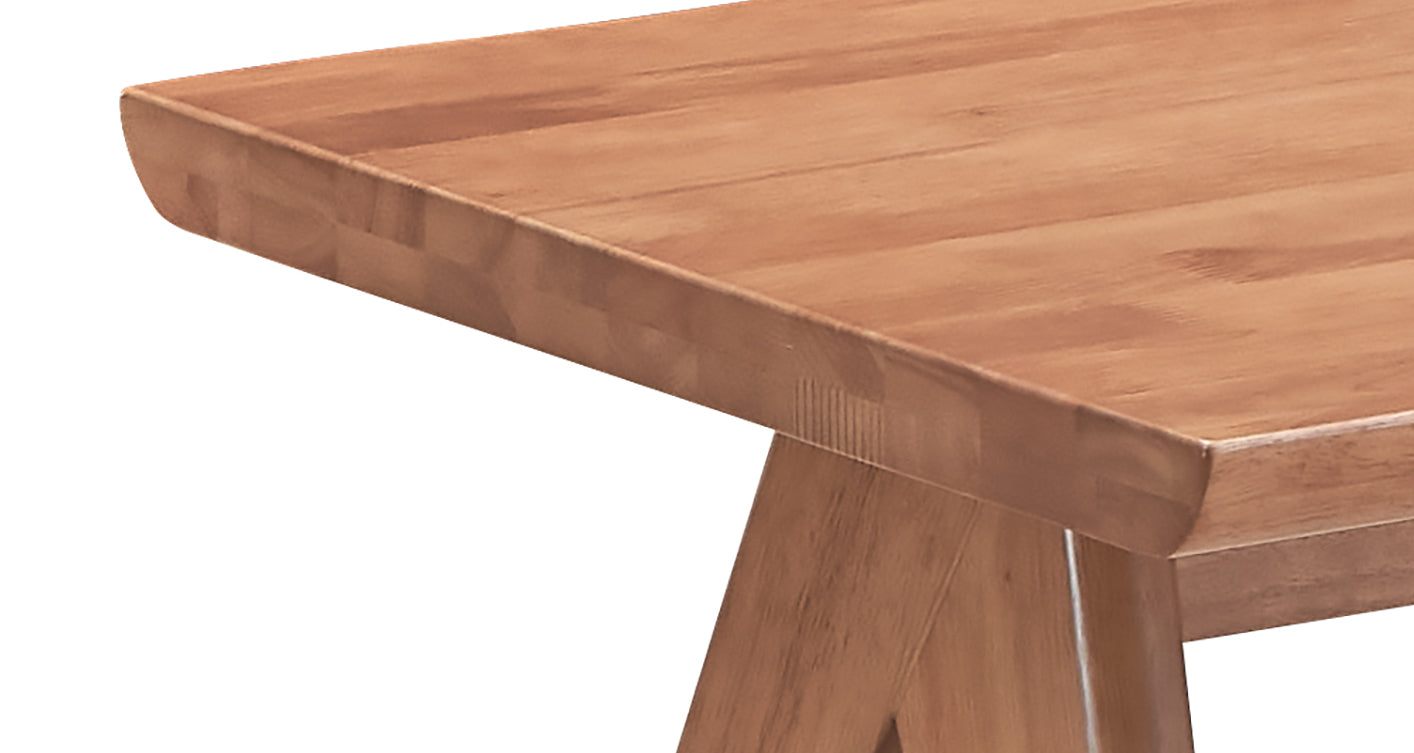 Closeup of a solid wood bench with a natural wood grain and rounded edges