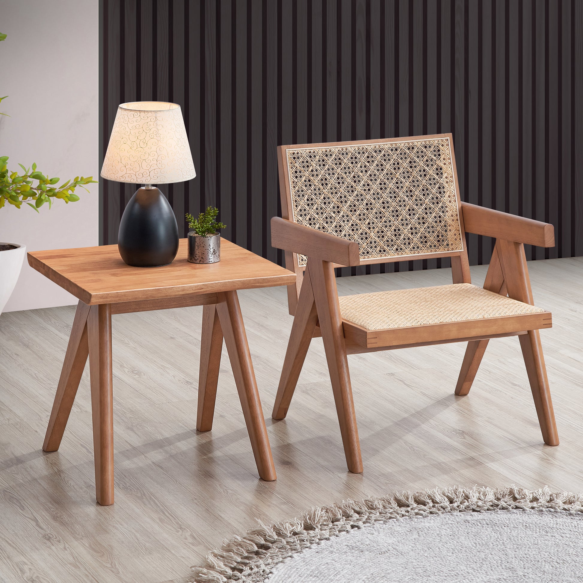 Natural wood armchair with intricate rattan back and seat for a boho living space