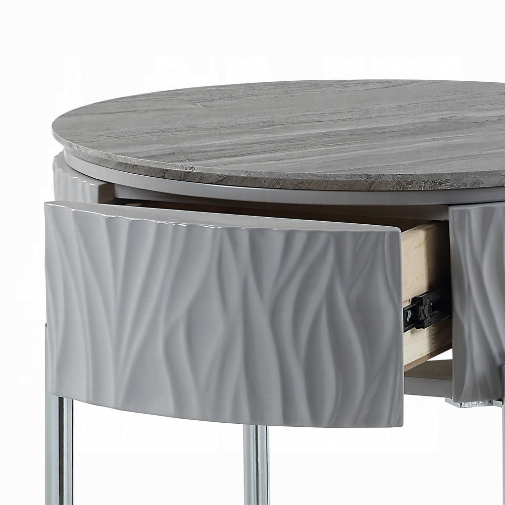 Gray marble top round nightstand with wavetextured white drawer and chrome legs