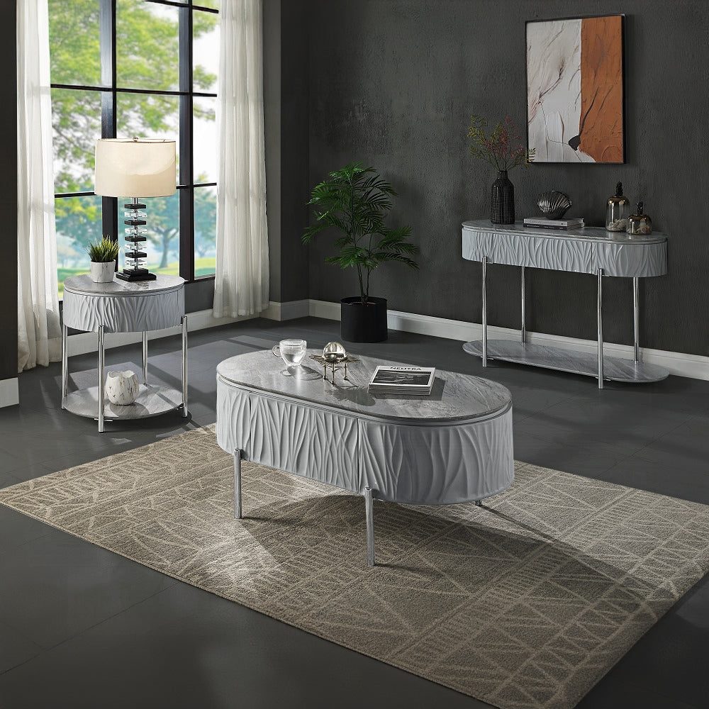 Oval grey textured coffee table with chrome legs and a marble top