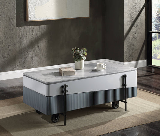 Modern white coffee table with grey marble top and fluted base