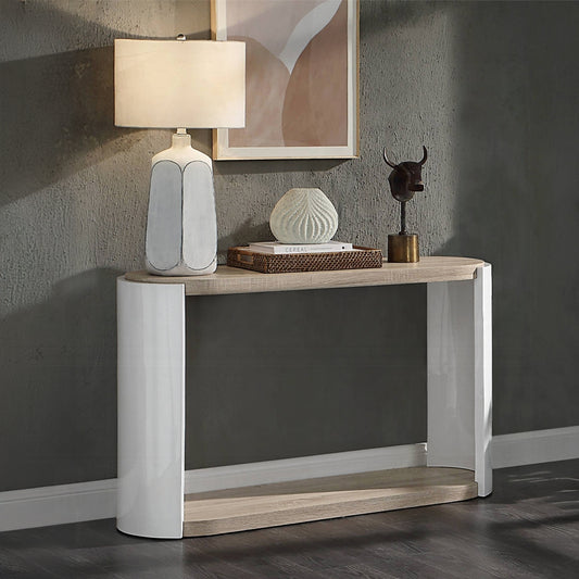 Modern white and blue ceramic table lamp with cream shade on console table