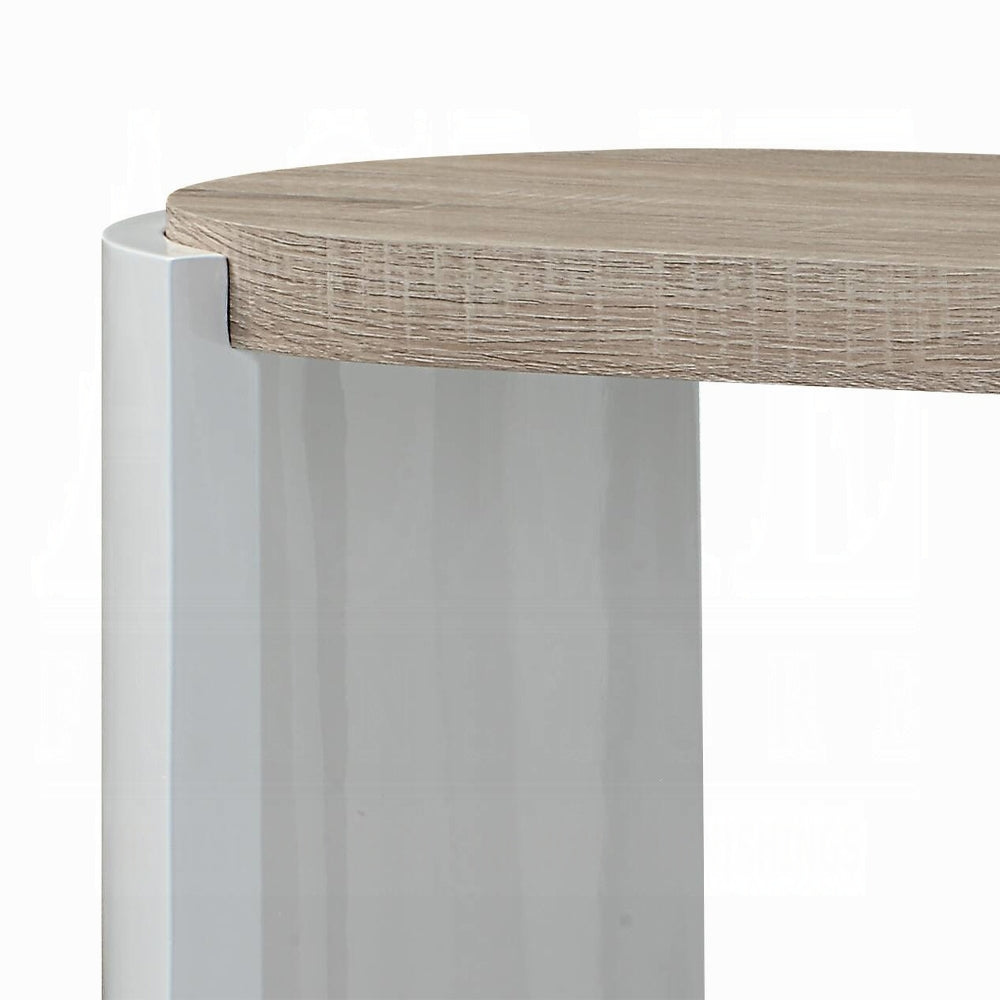Round wood top table with white pedestal base