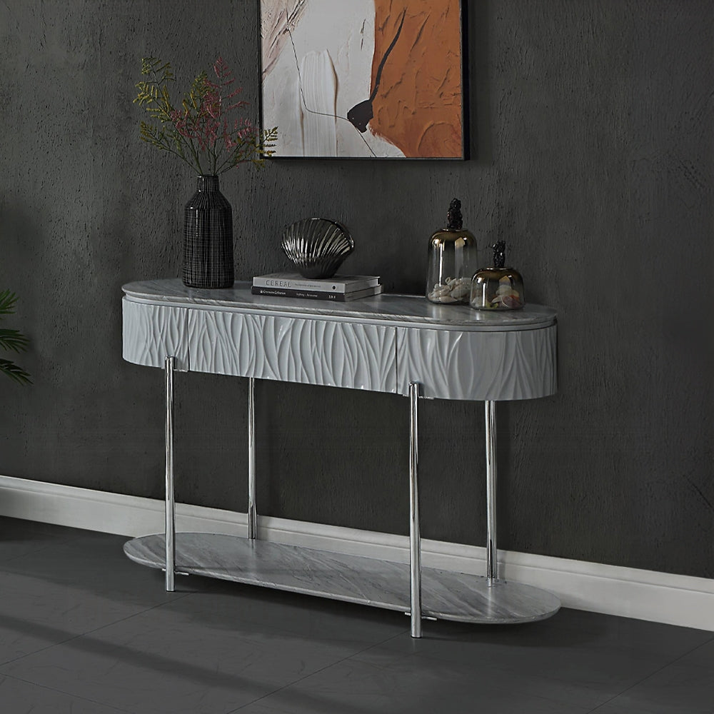 Gray marble top console table with textured drawer front and chrome legs ideal for entryways