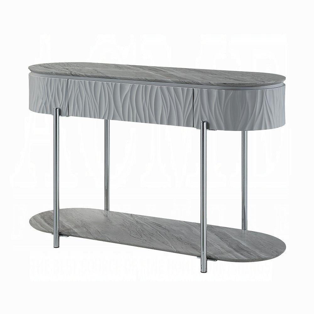 Grey oval console table with textured drawer fronts and marble top