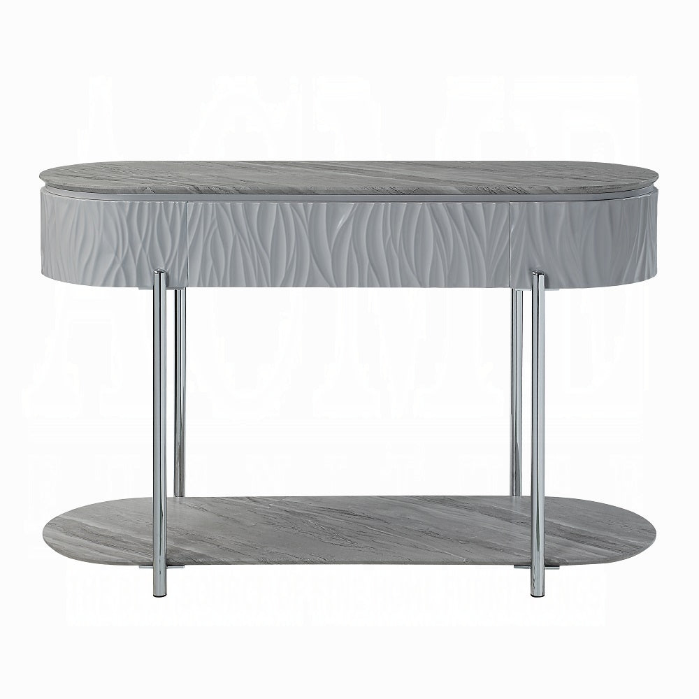 Grey oval console table with textured drawer fronts and marble top