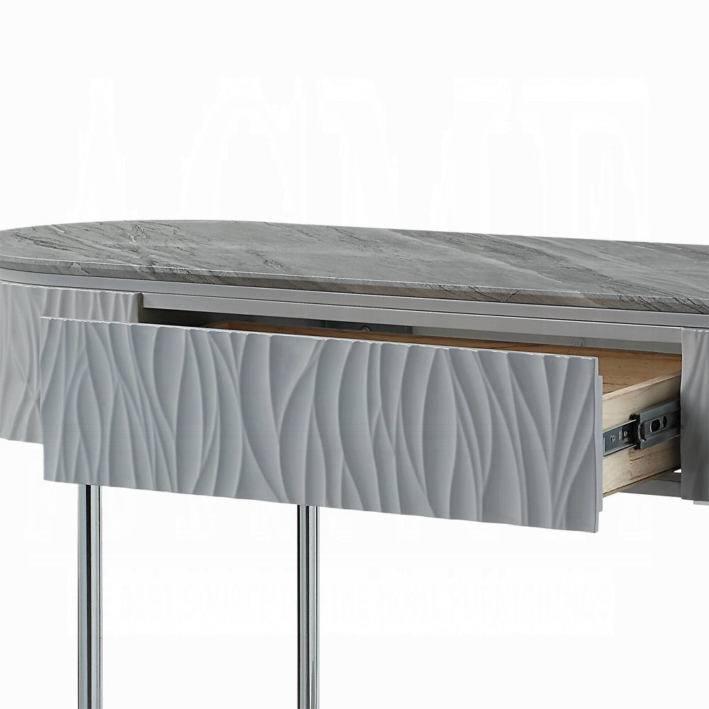 Oval modern console table with grey marble top and white textured drawer
