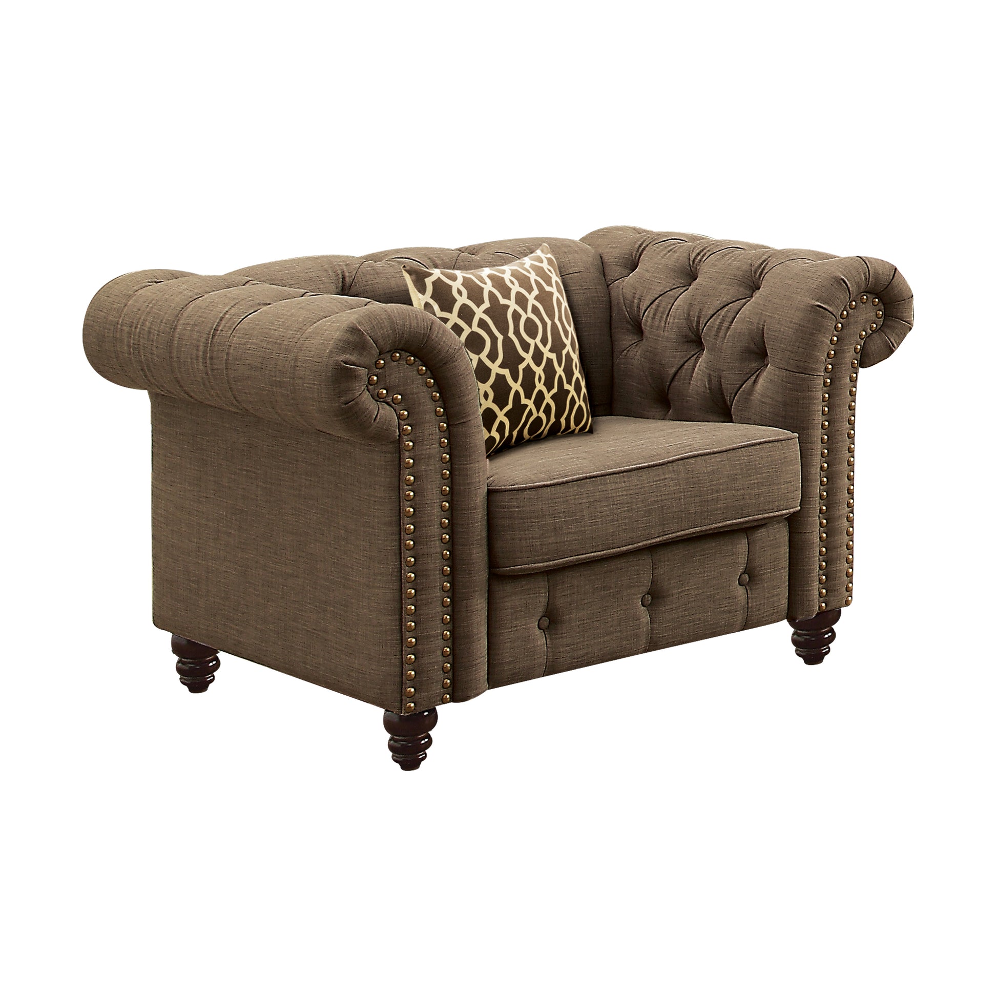 Brown linen tufted chesterfield armchair with ornate brass nailhead trim and decorative pillow