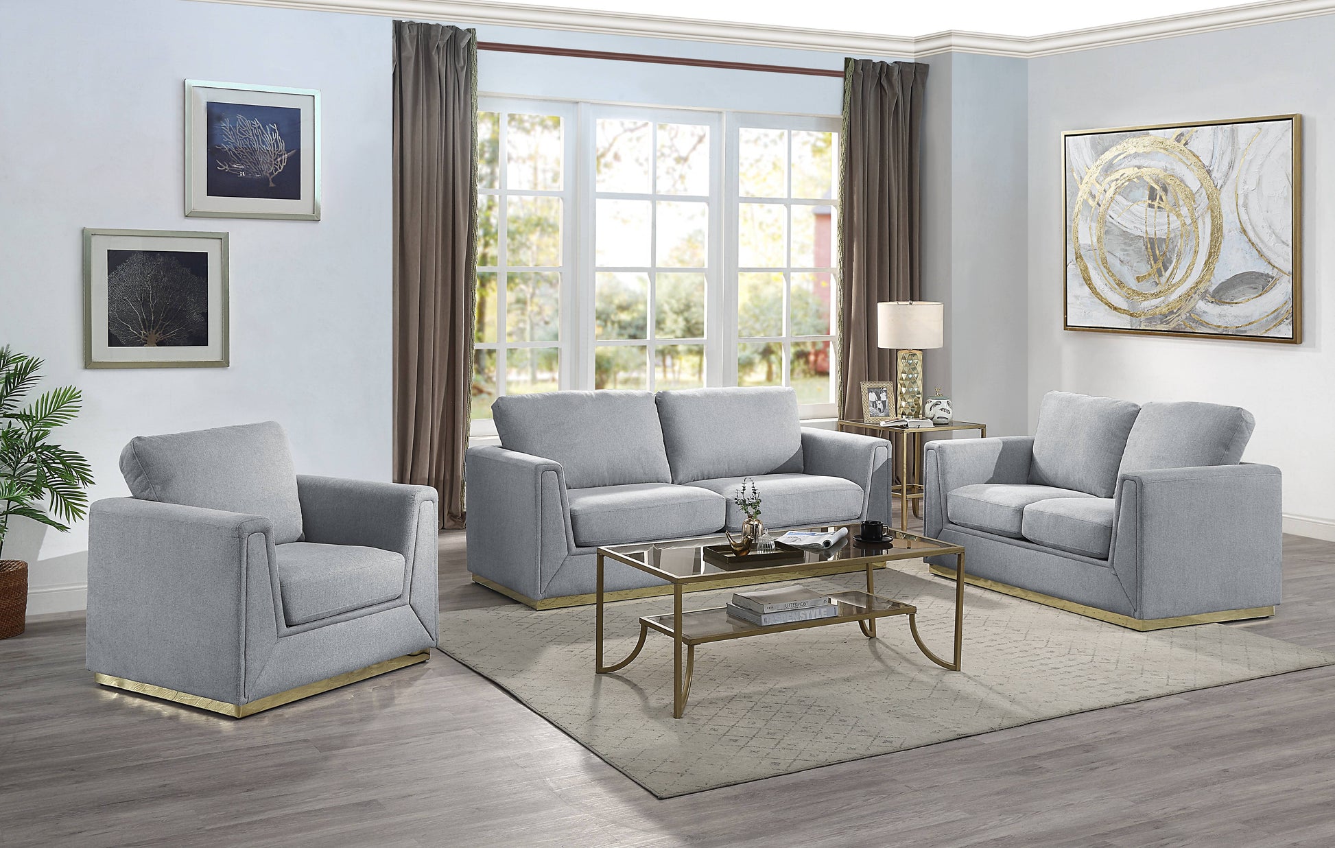 Light grey upholstered armchair with gold base modern living room accent