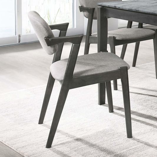 Midcentury modern dining chair with grey upholstered seat and dark wood frame
