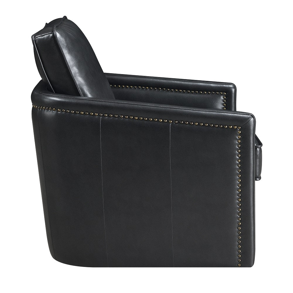Black leather accent chair with brass nailhead trim detail