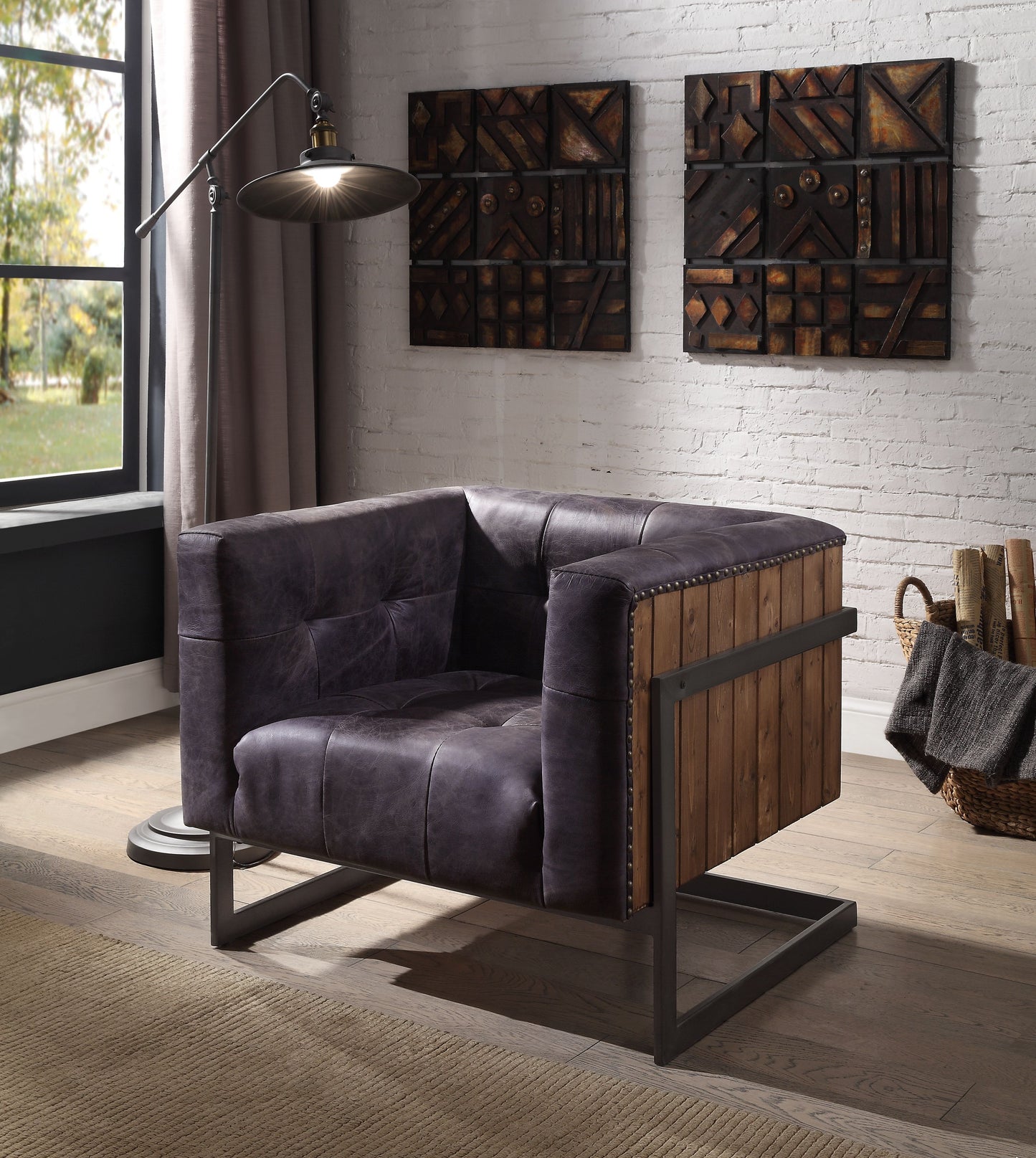 Dark gray leather accent chair with wood paneling and metal frame