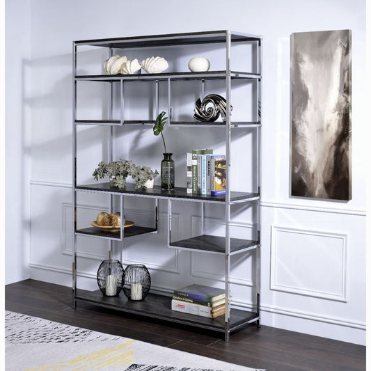 Chrome and black metal open bookshelf with decorative items