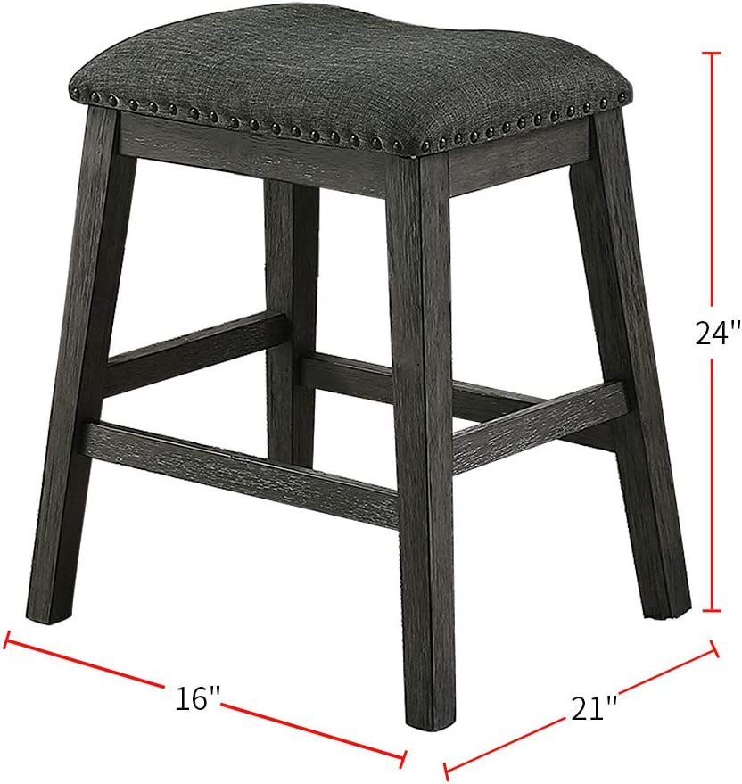 Dark gray upholstered counter stool with distressed wood frame and nailhead trim