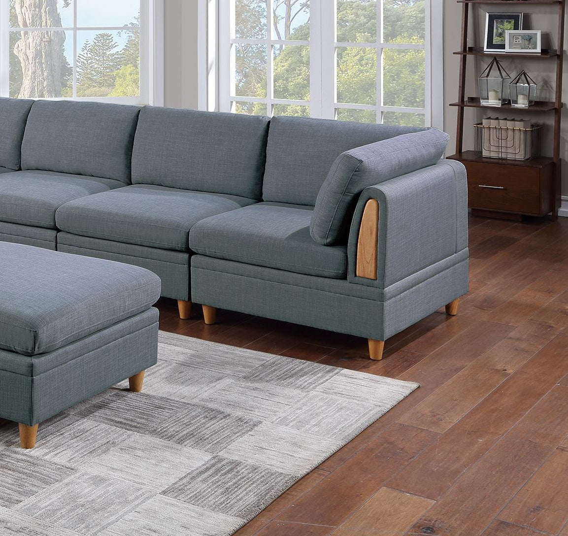 Gray sectional sofa with wooden arm accent and matching ottoman for living room