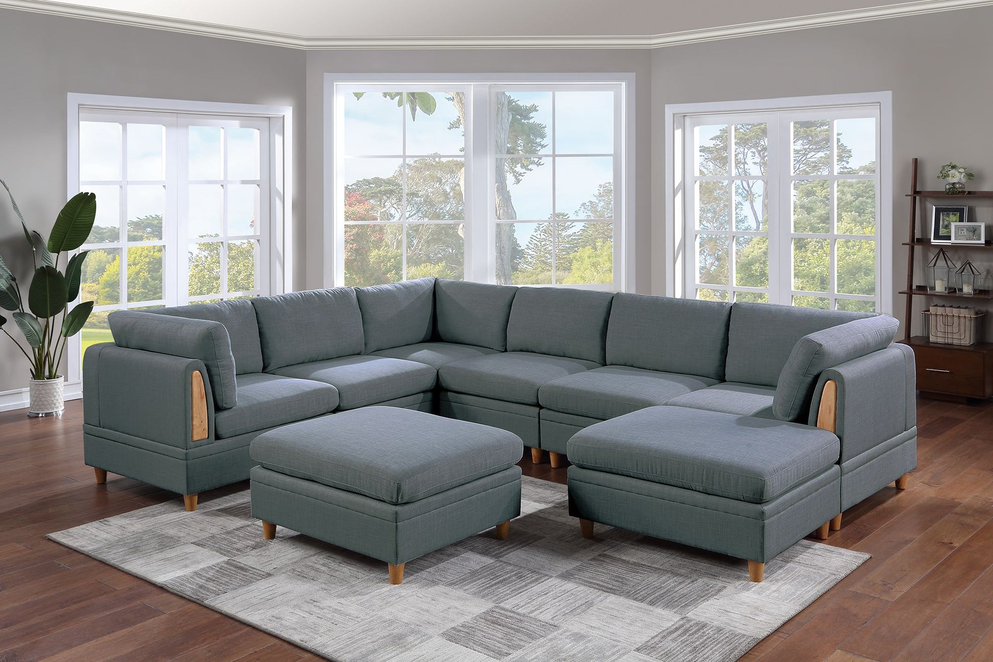Gray fabric sectional sofa with wooden accents and two storage ottomans