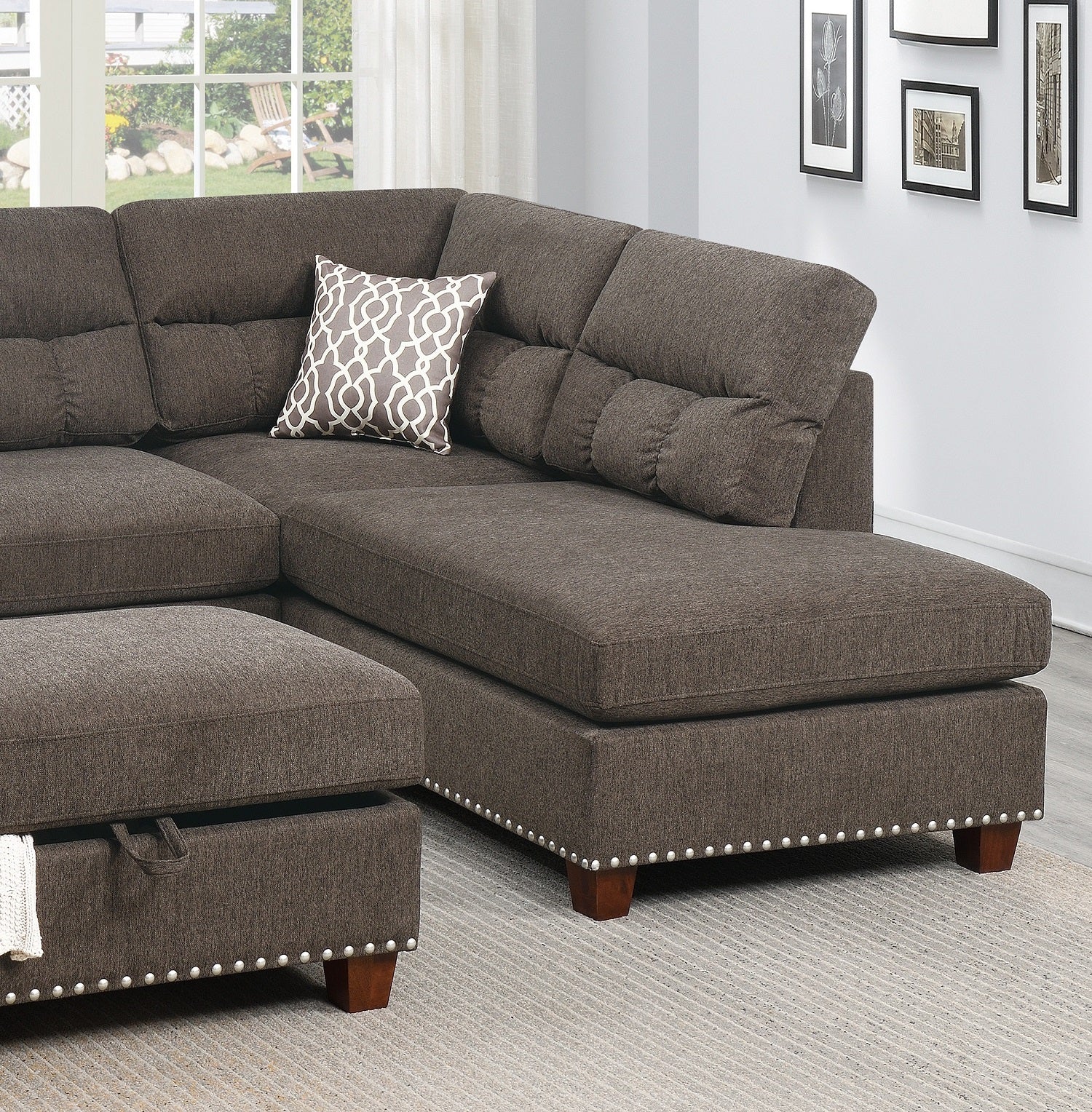 Brown fabric sectional sofa with tufted back cushions and decorative pillow