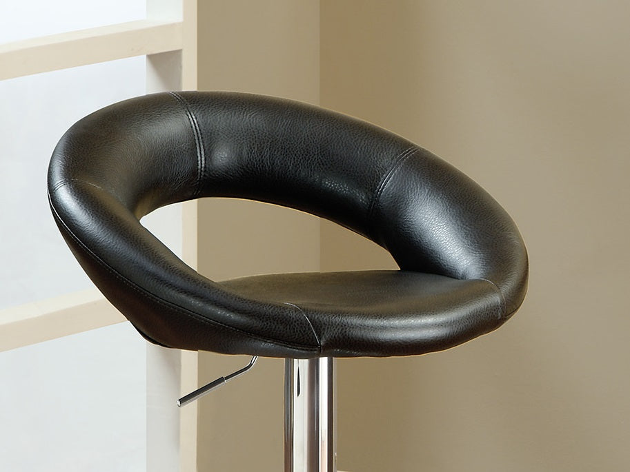 Black faux leather bar stool with a curved seat and chrome base