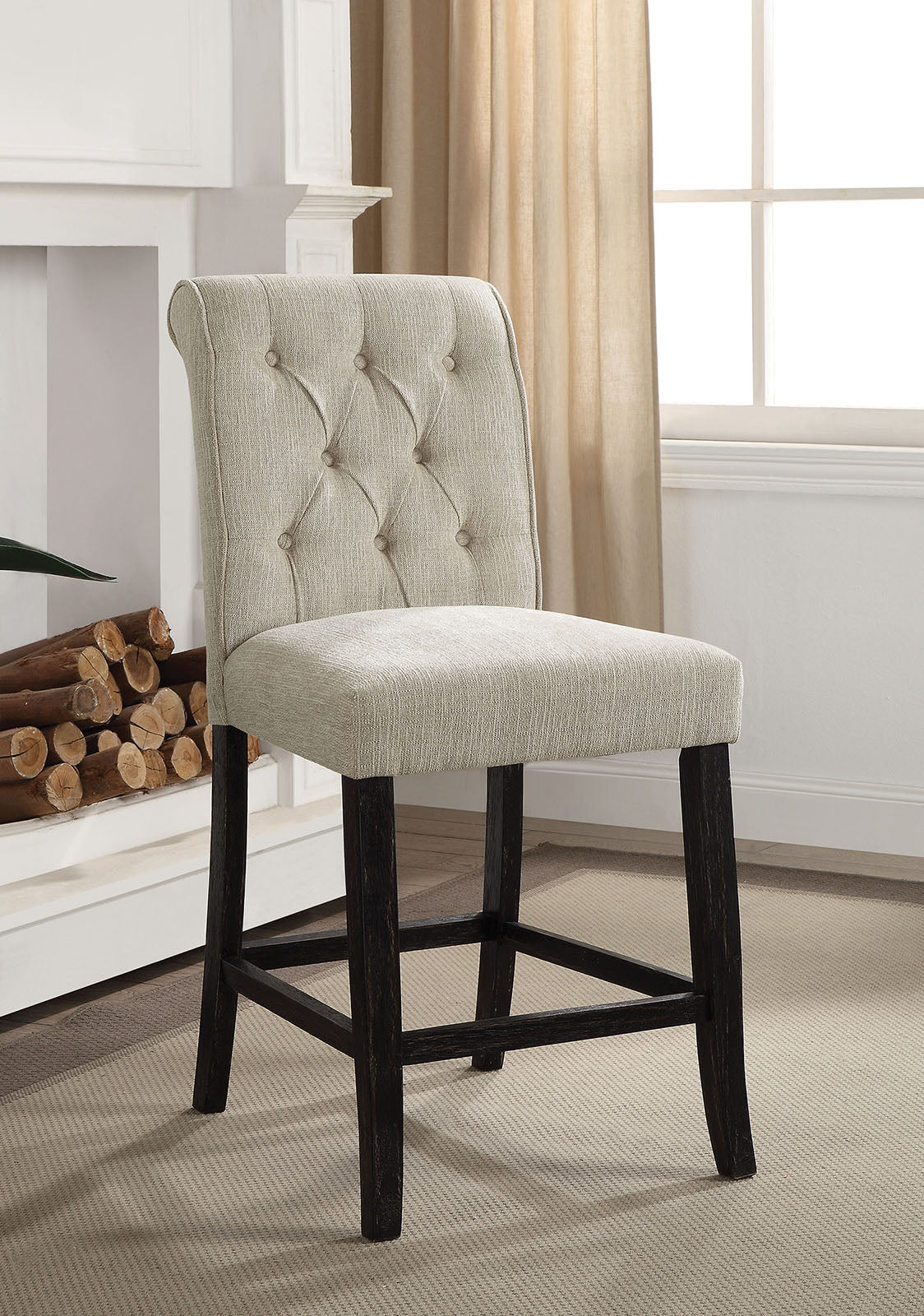 Tufted beige fabric bar stool with dark wood legs and classic button detail