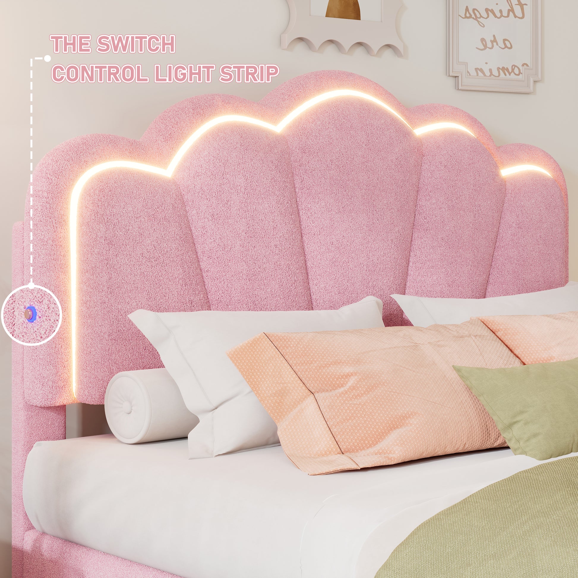 Pink velvet headboard with scalloped design and integrated LED light strip