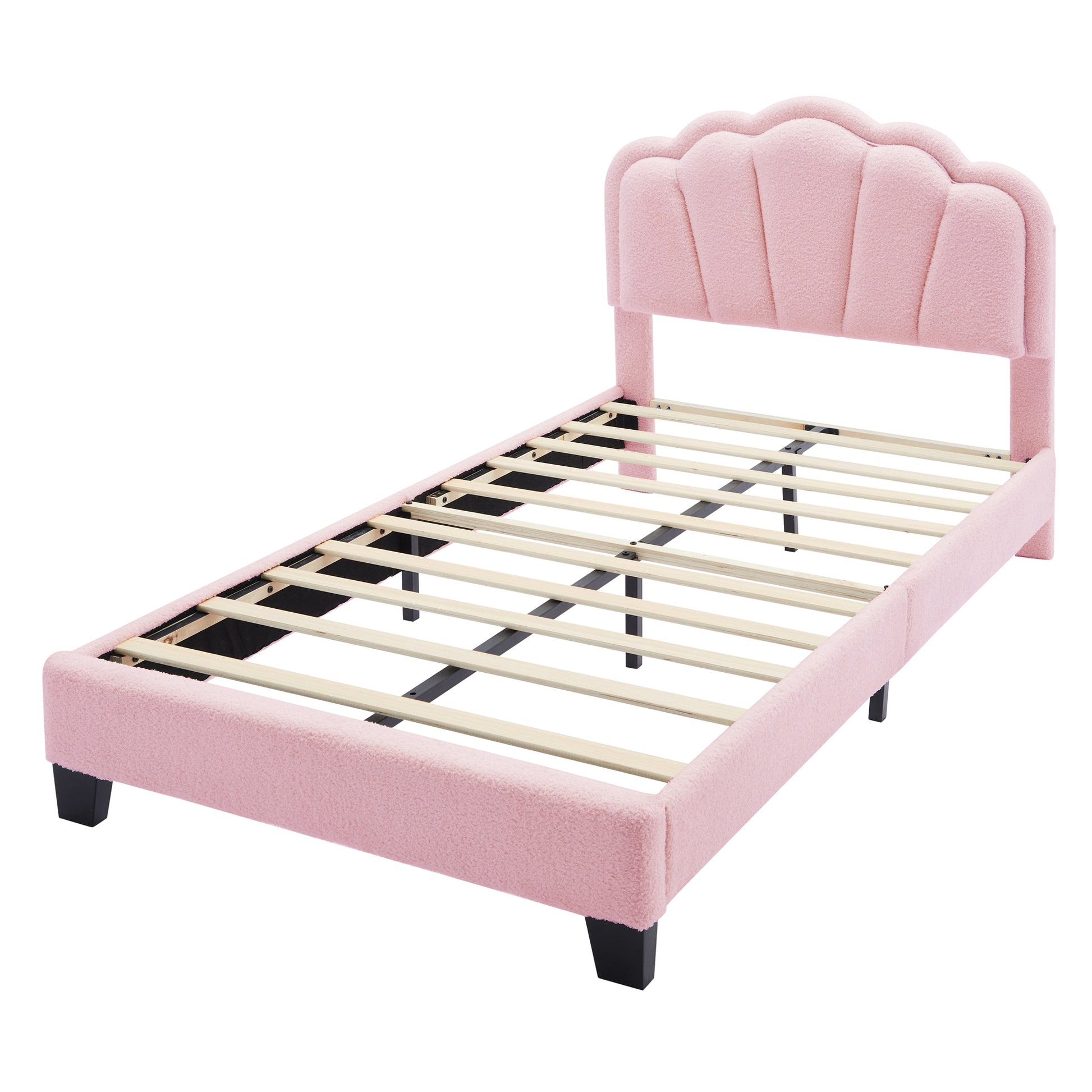 Pink sherpa upholstered twin bed frame with scalloped headboard and wooden slats