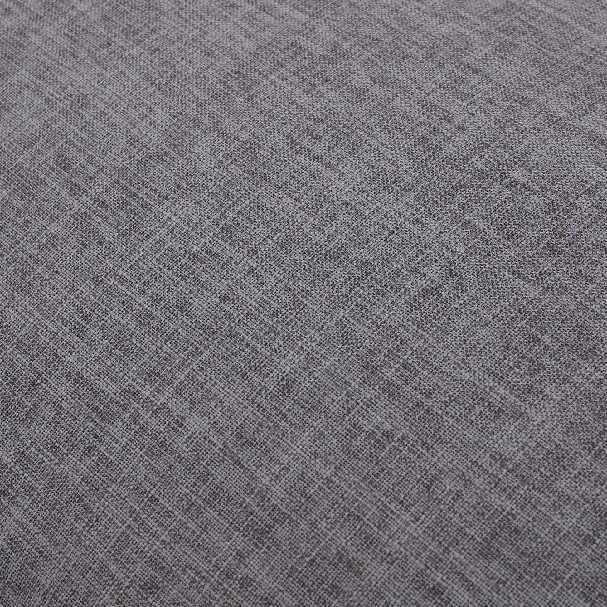 Closeup view of a grey textured fabric with a subtle flecked pattern ideal for upholstery