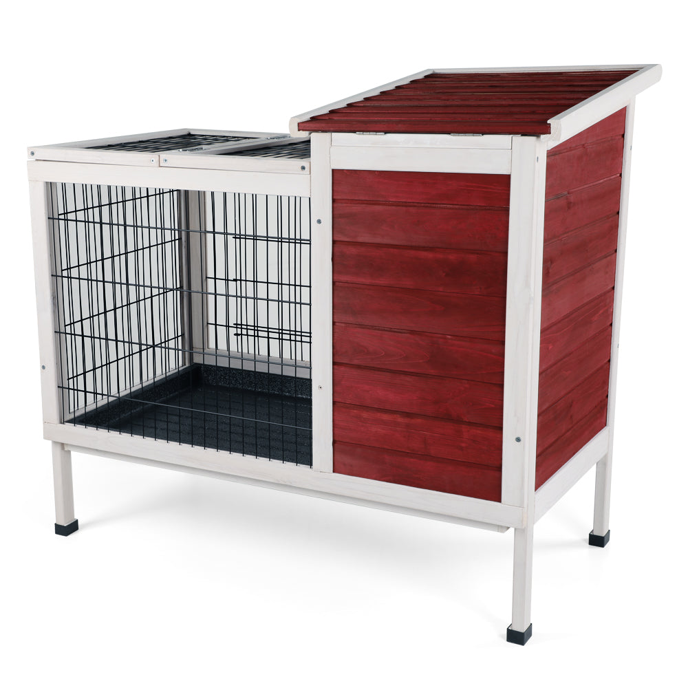Red and white wooden outdoor dog kennel with wire mesh enclosure and raised legs