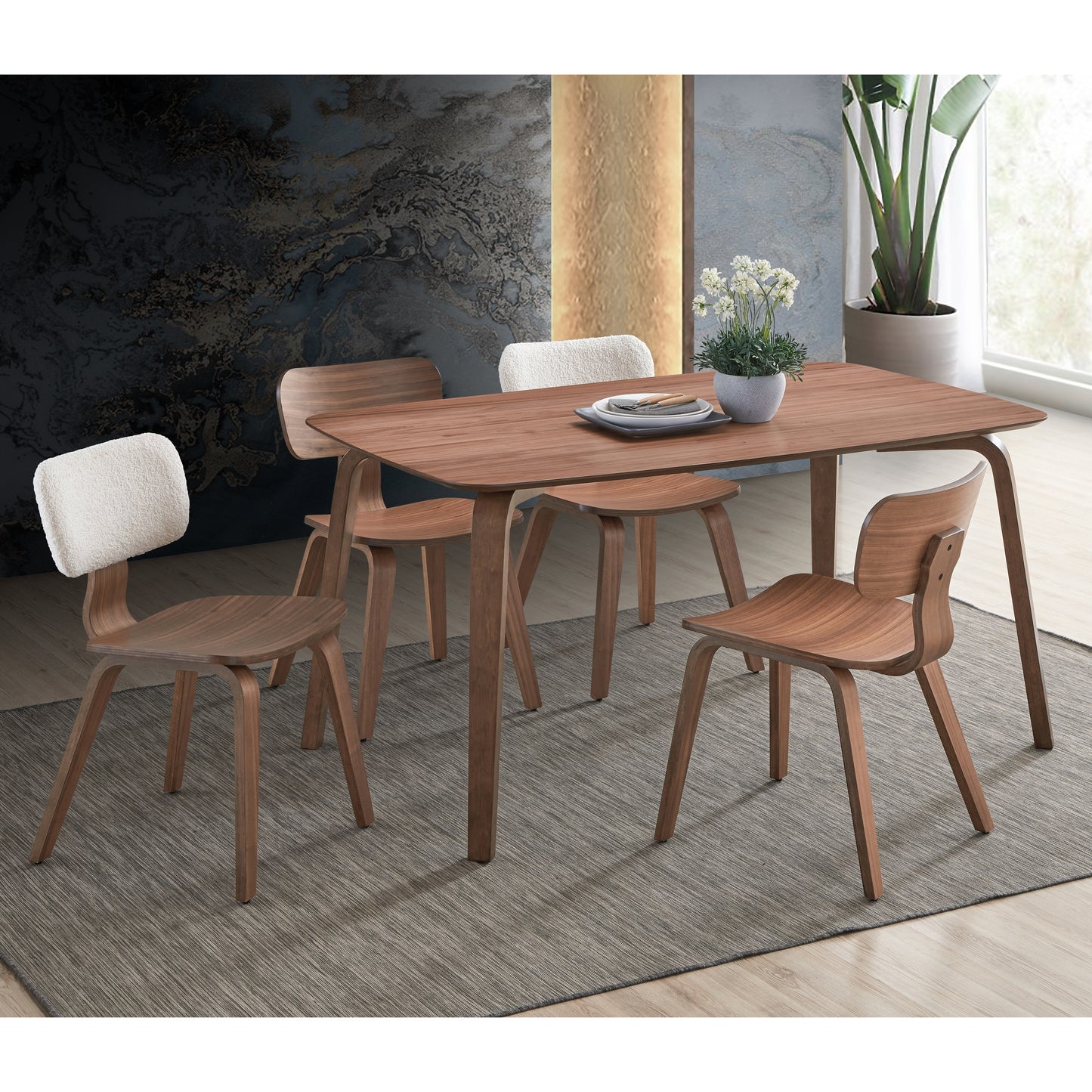 Midcentury modern walnut dining table with curved wooden chairs seating four